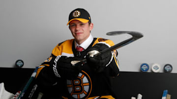 VANCOUVER, BRITISH COLUMBIA - JUNE 21: John Beecher poses for a portrait after being selected thirtieth overall by the Boston Bruins during the first round of the 2019 NHL Draft at Rogers Arena on June 21, 2019 in Vancouver, Canada. (Photo by Kevin Light/Getty Images)