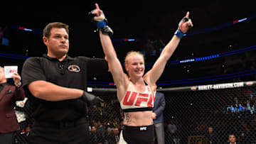 CHICAGO, IL - JULY 23: Valentina Shevchenko of Kyrgyzstan celebrates after defeating Holly Holm by unanimous decision in their women's bantamweight bout during the UFC Fight Night event at the United Center on July 23, 2016 in Chicago, Illinois. (Photo by Josh Hedges/Zuffa LLC/Zuffa LLC via Getty Images)