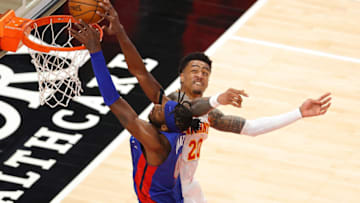 Jerami Grant #9 of the Detroit Pistons dunks against John Collins #20 of the Atlanta Hawks (Photo by Kevin C. Cox/Getty Images)