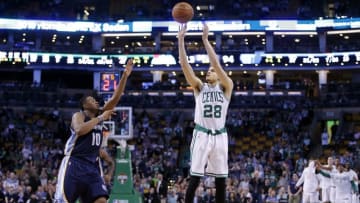 Mar 9, 2016; Boston, MA, USA; Boston Celtics guard R.J. Hunter (28) shoots for three points against Memphis Grizzlies forward Jarell Martin (10) in the second half at TD Garden. The Celtics defeated Memphis 116-96. Mandatory Credit: David Butler II-USA TODAY Sports