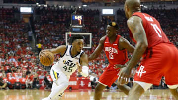 Donovan Mitchell, Utah Jazz. PJ Tucker, Clint Capela, Houston Rockets. (Photo by Tim Warner/Getty Images)
