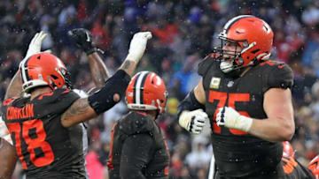Browns guard Joel Bitonio (75) and tackle Jack Conklin (78) celebrate after Nick Chubb scored the game-winning touchdown in overtime against the Buccaneers, Sunday, Nov. 27, 2022, in Cleveland.Browns27jl 8