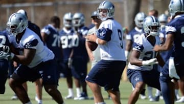 Jul 24, 2014; Oxnard, CA, USA; Dallas Cowboys quarterback Tony Romo (9) goes through drills during training camp at the River Ridge Playing Fields. Mandatory Credit: Jayne Kamin-Oncea-USA TODAY Sports