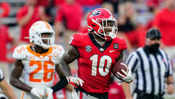 Oct 10, 2020; Athens, Georgia, USA; Georgia Bulldogs wide receiver Kearis Jackson (10) reacts after catching a long pass behind Tennessee Volunteers defensive back Theo Jackson (26) during the second half at Sanford Stadium. Mandatory Credit: Dale Zanine-USA TODAY Sports