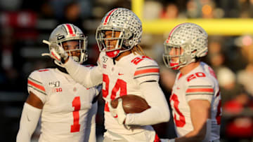 PISCATAWAY, NEW JERSEY - NOVEMBER 16: Shaun Wade #24 of the Ohio State Buckeyes celebrates his interception with teammates Jeff Okudah #1 and Pete Werner #20 in the first quarter against the Rutgers Scarlet Knights at SHI Stadium on November 16, 2019 in Piscataway, New Jersey. (Photo by Elsa/Getty Images)