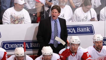 GLENDALE, AZ - APRIL 16: Head coach Mike Babcock of the Detroit Red Wings reacts in Game Two of the Western Conference Quarterfinals against the Phoenix Coyotes during the 2010 NHL Stanley Cup Playoffs at Jobing.com Arena on April 16, 2010 in Glendale, Arizona. The Red Wings defeated the Coyotes 7-4 to tie the series at 1-1. (Photo by Christian Petersen/Getty Images)