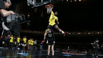 Mar 28, 2016; Chicago, IL, USA; McDonalds All-American forward Josh Jackson dunks over Nancy Mulkey during the McDonalds All-American Powerade Jamfest at the Chicago Theatre. Mandatory Credit: Brian Spurlock-USA TODAY Sports