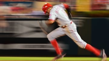 Aug 9, 2016; St. Louis, MO, USA; Cincinnati Reds center fielder Billy Hamilton (6) steals second base during the eighth inning against the St. Louis Cardinals at Busch Stadium. The Reds won 7-4. Mandatory Credit: Jeff Curry-USA TODAY Sports