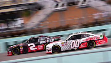 HOMESTEAD, FLORIDA - NOVEMBER 16: Cole Custer, driver of the #00 Haas Automation Ford, and Tyler Reddick, driver of the #2 Tame the Beast Chevrolet, race during the NASCAR Xfinity Series Ford EcoBoost 300 at Homestead-Miami Speedway on November 16, 2019 in Homestead, Florida. (Photo by Jared C. Tilton/Getty Images)