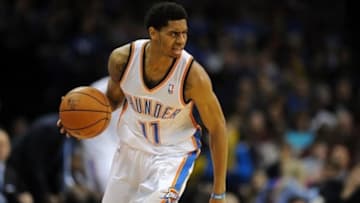 Jan 11, 2014; Oklahoma City, OK, USA; Oklahoma City Thunder shooting guard Jeremy Lamb (11) handles the ball against the Milwaukee Bucks at Chesapeake Energy Arena. Mandatory Credit: Mark D. Smith-USA TODAY Sports