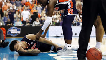 KANSAS CITY, MISSOURI - MARCH 29: Chuma Okeke #5 of the Auburn Tigers reacts after suffering an injury against the North Carolina Tar Heels during the 2019 NCAA Basketball Tournament Midwest Regional at Sprint Center on March 29, 2019 in Kansas City, Missouri. (Photo by Jamie Squire/Getty Images)