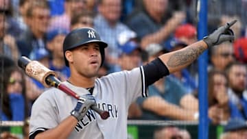 Sep 24, 2016; Toronto, Ontario, CAN New York Yankees designated hitter Gary Sanchez (24) gestures as a ball hit by center fielder Jacoby Ellsbury (not pictured) lands foul during a 3-0 loss to Toronto Blue Jays at Rogers Centre. Mandatory Credit: Dan Hamilton-USA TODAY Sports