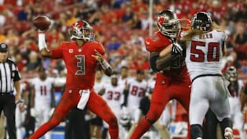 Nov 3, 2016; Tampa, FL, USA; Atlanta Falcons defensive end Brooks Reed (50) holds back Tampa Bay Buccaneers tackle Demar Dotson (69) as quarterback Jameis Winston (3) throws a pass during the second half of a football game at Raymond James Stadium. The Falcons won 43-28. Mandatory Credit: Reinhold Matay-USA TODAY Sports