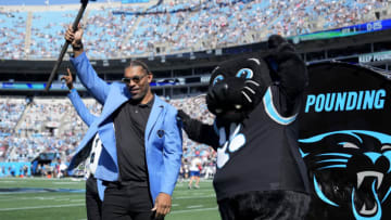 Oct 29, 2023; Charlotte, North Carolina, USA; Former Carolina Panthers great Julius Peppers is honored on the field before the game at Bank of America Stadium. Mandatory Credit: Bob Donnan-USA TODAY Sports