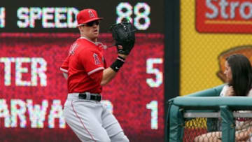 May 14, 2014; Philadelphia, PA, USA; Los Angeles Angels right fielder Collin Cowgill (7) catches a foul ball for an out in the ninth inning of a game against the Philadelphia Phillies at Citizens Bank Park. The Angles won 3-0. Mandatory Credit: Bill Streicher-USA TODAY Sports
