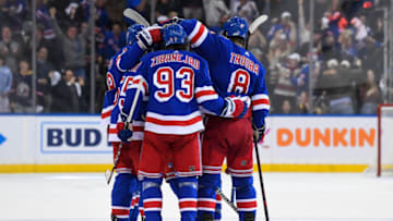 May 11, 2022; New York, New York, USA; New York Rangers celebrate the empty net goal by defenseman Ryan Lindgren (55) against the Pittsburgh Penguins during the third period in game five of the first round of the 2022 Stanley Cup Playoffs at Madison Square Garden. Mandatory Credit: Dennis Schneidler-USA TODAY Sports