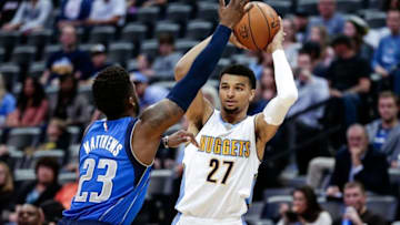 Oct 21, 2016; Denver, CO, USA; Dallas Mavericks guard Wesley Matthews (23) defends against Denver Nuggets guard Jamal Murray (27) in the first quarter at the Pepsi Center. Mandatory Credit: Isaiah J. Downing-USA TODAY Sports