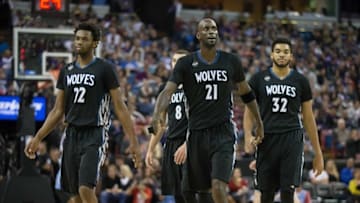 Nov 27, 2015; Sacramento, CA, USA; Minnesota Timberwolves guard Andrew Wiggins (22), guard Zach LaVine (8), forward Kevin Garnett (21) and center Karl-Anthony Towns (32) look on during a timeout against the Sacramento Kings during the third quarter at Sleep Train Arena. The The Timberwolves won 101-91. Mandatory Credit: Kelley L Cox-USA TODAY Sports
