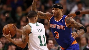 Dec 13, 2013; Boston, MA, USA; New York Knicks power forward Kenyon Martin (3) defends against Boston Celtics shooting guard Courtney Lee (11) during the first half at TD Garden. Mandatory Credit: Mark L. Baer-USA TODAY Sports