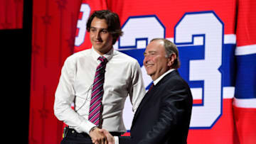 Jun 28, 2023; Nashville, Tennessee, USA; Montreal Canadians draft pick David Reinbacher shakes hands with NHL commissioner Gary Bettman after being selected with the fifth pick in round one of the 2023 NHL Draft at Bridgestone Arena. Mandatory Credit: Christopher Hanewinckel-USA TODAY Sports