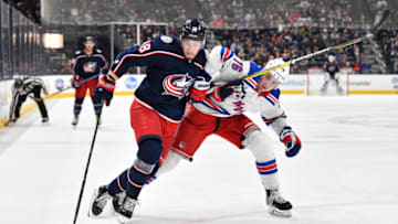 COLUMBUS, OH - DECEMBER 5: Pierre-Luc Dubois #18 of the Columbus Blue Jackets battles with Brady Skjei #76 of the New York Rangers for control of the puck on December 5, 2019 at Nationwide Arena in Columbus, Ohio. (Photo by Jamie Sabau/NHLI via Getty Images)