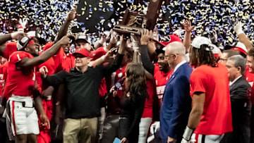 ATLANTA, GA - DECEMBER 3: Georgia Bulldogs are presented with the SEC Championship Trophy after a game between LSU Tigers and Georgia Bulldogs at Mercedes-Benz Stadium on December 3, 2022 in Atlanta, Georgia. (Photo by Steve Limentani/ISI Photos/Getty Images)