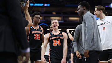 Mar 16, 2023; Sacramento, CA, USA; Princeton Tigers guard Blake Peters (24) and forward Keeshawn Kellman (32) celebrate the victory against the Arizona Wildcats at Golden 1 Center. Mandatory Credit: Kelley L Cox-USA TODAY Sports