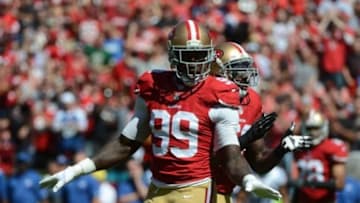 September 22, 2013; San Francisco, CA, USA; San Francisco 49ers outside linebacker Aldon Smith (99) celebrates after tackling Indianapolis Colts quarterback Andrew Luck (12, not pictured) during the first quarter at Candlestick Park. Mandatory Credit: Kyle Terada-USA TODAY Sports