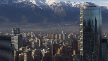 SANTIAGO, CHILE - FEBRUARY 14: View of Titanium Tower (R) and the Andes on the back on February 14, 2015 in Santiago de Chile, Chile. Santiago will be one of the eight host cities of the next Copa America Chile 2015 from June 11th to July 04th. (Photo by Marcelo Hernandez/LatinContent via Getty Images)