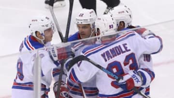 Feb 2, 2016; Newark, NJ, USA; The New York Rangers celebrate a goal by New York Rangers center J.T. Miller (10) during the third period at Prudential Center. The Devils defeated the Rangers 3-2. Mandatory Credit: Ed Mulholland-USA TODAY Sports
