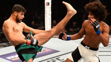 SALT LAKE CITY, UT - AUGUST 06: (L-R) Yair Rodriguez of Mexico kicks Alex Caceres in their featherweight bout during the UFC Fight Night event at Vivint Smart Home Arena on August 6, 2016 in Salt Lake City, Utah. (Photo by Jeff Bottari/Zuffa LLC/Zuffa LLC via Getty Images)