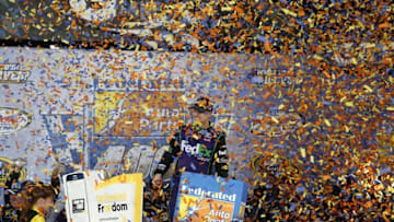 Sep 10, 2016; Richmond, VA, USA; Sprint Cup Series driver Denny Hamlin (11) celebrates in victory lane after winning the Federated Auto Parts 400 at Richmond International Raceway. Mandatory Credit: Amber Searls-USA TODAY Sports