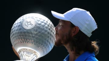 SUN CITY, SOUTH AFRICA - NOVEMBER 17: Tommy Fleetwood of England poses with the trophy after winning the Nedbank Golf Challenge hosted by Gary Player at the Gary Player CC on November 17, 2019 in Sun City, South Africa. (Photo by Warren Little/Getty Images)
