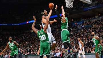 MILWAUKEE, WI - APRIL 26: Jabari Parker #12 of the Milwaukee Bucks goes to the basket against the Boston Celtics in Game Six of Round One of the 2018 NBA Playoffs on April 26, 2018 at the BMO Harris Bradley Center in Milwaukee, Wisconsin. NOTE TO USER: User expressly acknowledges and agrees that, by downloading and or using this Photograph, user is consenting to the terms and conditions of the Getty Images License Agreement. Mandatory Copyright Notice: Copyright 2018 NBAE. (Photo by Jesse D. Garrabrant/NBAE via Getty Images)