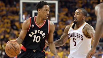 May 17, 2016; Cleveland, OH, USA; Toronto Raptors guard DeMar DeRozan (10) works against Cleveland Cavaliers guard J.R. Smith (5) during the first quarter in game one of the Eastern conference finals of the NBA Playoffs at Quicken Loans Arena. Mandatory Credit: Ken Blaze-USA TODAY Sports