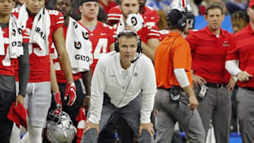 Ohio State Buckeyes head coach Urban Meyer watches his team during a punt return against Northwestern Wildcats during the 2nd quarter in the Big Ten Championship game in Indianapolis, Ind on December 1, 2018. [Kyle Robertson/Dispatch]