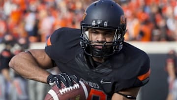 Nov. 9, 2013; Stillwater, OK, USA; Oklahoma State Cowboys running back Corey Bennett (20) during warmups before the game against the Kansas Jayhawks at Boone Pickens Stadium. Mandatory Credit: Richard Rowe-USA TODAY Sports