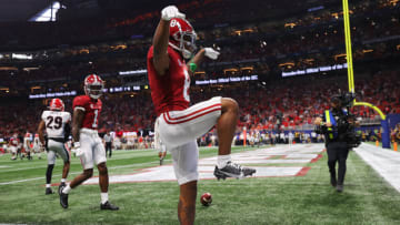 ATLANTA, GEORGIA - DECEMBER 04: John Metchie III #8 of the Alabama Crimson Tide reacts after scoring a touchdown in the second quarter of the SEC Championship game against the Georgia Bulldogs at Mercedes-Benz Stadium on December 04, 2021 in Atlanta, Georgia. (Photo by Kevin C. Cox/Getty Images)