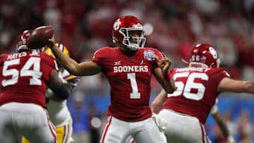 ATLANTA, GEORGIA - DECEMBER 28: Jalen Hurts #1 of the Oklahoma Sooners plays against the LSU Tigers during the College Football Playoff Semifinal in the Chick-fil-A Peach Bowl at Mercedes-Benz Stadium on December 28, 2019 in Atlanta, Georgia. (Photo by Gregory Shamus/Getty Images)