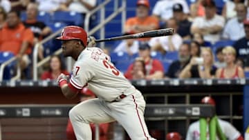 May 6, 2016; Miami, FL, USA; Philadelphia Phillies center fielder Odubel Herrera (37) connects for a base hit during the first inning against the Miami Marlins at Marlins Park. Mandatory Credit: Steve Mitchell-USA TODAY Sports