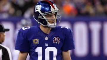 Nov 3, 2014; East Rutherford, NJ, USA; New York Giants quarterback Eli Manning (10) heads to the sideline after a three and out during the first half against the Indianapolis Colts at MetLife Stadium. Mandatory Credit: Noah K. Murray-USA TODAY Sports
