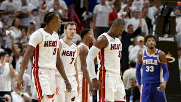 From left, the Miami Heat's Josh Richardson, Goran Dragic and Dwyane Wade react as the Philadelphia 76ers lead in the fourth quarter in Game 4 of the first-round NBA Playoff series at the AmericaneAirlines Arena in Miami on Saturday, April 21, 2018. The Sixers won, 106-102, for a 3-1 series lead. (Pedro Portal/El Nuevo Herald/TNS via Getty Images)