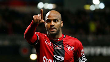 Guingamp's French forward Jimmy Briand celebrates after scoring a goal during the French L1 football match between Guingamp (EAG) and Troyes (ESTAC) on April 7, 2018, at the Roudourou stadium, in Guingamp, northwestern France. / AFP PHOTO / CHARLY TRIBALLEAU (Photo credit should read CHARLY TRIBALLEAU/AFP/Getty Images)