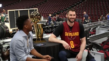 CLEVELAND, OH - JUNE 5: Donovan Mitchell of the Utah Jazz interviews Kevin Love #0 of the Cleveland Cavaliers during practice and media availability as part of the 2018 NBA Finals on June 5, 2018 at Quicken Loans Arena in Cleveland, Ohio. NOTE TO USER: User expressly acknowledges and agrees that, by downloading and or using this photograph, User is consenting to the terms and conditions of the Getty Images License Agreement. Mandatory Copyright Notice: Copyright 2018 NBAE (Photo by Joe Murphy/NBAE via Getty Images)