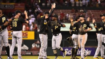Aug 13, 2015; St. Louis, MO, USA; Pittsburgh Pirates teammates celebrate after defeating the St. Louis Cardinals 10-5 at Busch Stadium. Mandatory Credit: Jasen Vinlove-USA TODAY Sports