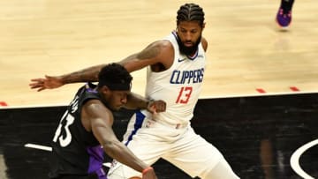 Toronto Raptors forward Pascal Siakam (43) tries to dribble past LA Clippers guard Paul George (13). Mandatory Credit: Robert Hanashiro-USA TODAY Sports