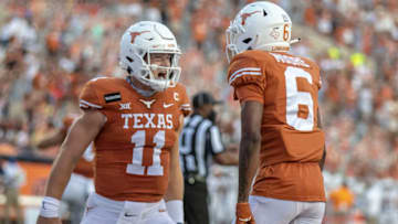 Joshua Moore, Sam Ehlinger, Texas Football Mandatory Credit: Ricardo B. Brazziell/American-Statesman via USA TODAY NETWORK