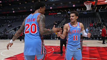 John Collins #20 and Trae Young #11 of the Atlanta Hawks (Copyright 2019 NBAE (Photo by Jasear Thompson/NBAE via Getty Images)