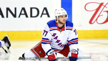 CALGARY, AB - MARCH 15: New York Rangers Defenceman Tony DeAngelo (77) warms up before an NHL game where the Calgary Flames hosted the New York Rangers on March 15, 2019, at the Scotiabank Saddledome in Calgary, AB. (Photo by Brett Holmes/Icon Sportswire via Getty Images)