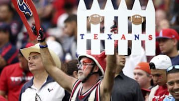 Oct 2, 2016; Houston, TX, USA; Houston Texans fan holds up signs during the game against the Tennessee Titans at NRG Stadium. Mandatory Credit: Kevin Jairaj-USA TODAY Sports